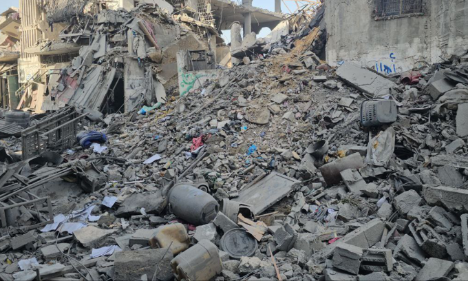 Five-Story Building in Gaza Hit by Bombing, 93 Dead